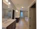 Bathroom featuring double vanity, soaking tub, and separate shower at 1946 Jeffery Nw Rd, Atlanta, GA 30318