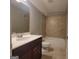 Cozy bathroom with vanity, toilet, and shower and bath combination at 1946 Jeffery Nw Rd, Atlanta, GA 30318