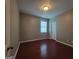 Bedroom featuring hardwood floors, neutral walls and natural light at 1946 Jeffery Nw Rd, Atlanta, GA 30318