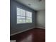 Bright bedroom with hardwood floors and large window, offering ample natural light at 1946 Jeffery Nw Rd, Atlanta, GA 30318