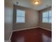 Neutral bedroom with hardwood floors and large windows at 1946 Jeffery Nw Rd, Atlanta, GA 30318