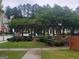 Community landscape featuring a garden and trees that create a serene, welcoming environment in the neighborhood at 1946 Jeffery Nw Rd, Atlanta, GA 30318
