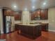 Modern kitchen with stainless steel appliances, granite countertops, and a center island, ideal for cooking at 1946 Jeffery Nw Rd, Atlanta, GA 30318