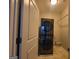 Laundry room featuring front load washer and dryer and wire shelving at 1946 Jeffery Nw Rd, Atlanta, GA 30318