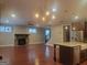 Spacious living room features wood floors, stone fireplace, open floorplan and plenty of natural light at 1946 Jeffery Nw Rd, Atlanta, GA 30318