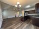 Open concept kitchen with granite countertops and stainless steel appliances at 6703 Biscayne Blvd, Rex, GA 30273