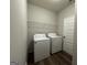 Laundry room featuring a new washer and dryer at 6703 Biscayne Blvd, Rex, GA 30273