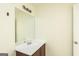 Bathroom features a vanity with sink, mirror, and light fixture at 1562 Onalee Dr, Hampton, GA 30228