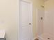 Clean bathroom with a standing shower, white door and neutral paint color at 1562 Onalee Dr, Hampton, GA 30228