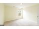 Empty bedroom features a window, neutral walls, carpeted floors, and a closet at 1562 Onalee Dr, Hampton, GA 30228