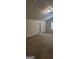 Bedroom with neutral walls, carpeting, a vaulted ceiling, and a window providing natural light at 1562 Onalee Dr, Hampton, GA 30228