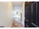 Inviting entryway showcases an open floor plan leading into a carpeted living space at 1562 Onalee Dr, Hampton, GA 30228