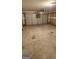 Spacious garage with an automatic door that can be used for parking or storage at 1562 Onalee Dr, Hampton, GA 30228