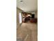 Modern kitchen featuring dark wood cabinets, a kitchen island, and a door to the outside at 1562 Onalee Dr, Hampton, GA 30228