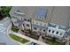 Aerial view of townhomes with brick facades, detailed landscaping and gray-toned roofs at 2282 Mclean Chase Se, Smyrna, GA 30080