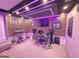 Contemporary entertainment room features modern equipment, neon lights, and sleek decor at 2282 Mclean Chase Se, Smyrna, GA 30080