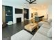 Open concept living room flows into a modern kitchen with stainless steel appliances at 2282 Mclean Chase Se, Smyrna, GA 30080