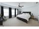 Inviting main bedroom features a tray ceiling, neutral color palette, and lots of natural light at 2282 Mclean Chase Se, Smyrna, GA 30080