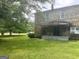 Charming stone home with a covered front porch and lush lawn at 1085 Pleasant Hill Nw Rd, Conyers, GA 30012