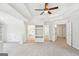 Spacious bedroom with tray ceilings, built-in shelves, and neutral paint at 765 Brooks Cir, Stone Mountain, GA 30087