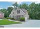 Well-maintained brick home with an attached garage and meticulously landscaped yard at 765 Brooks Cir, Stone Mountain, GA 30087