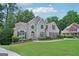 Beautifully landscaped brick home with a well-manicured lawn and charming curb appeal at 765 Brooks Cir, Stone Mountain, GA 30087
