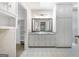 Bright bathroom features a double vanity, ample storage, and modern fixtures and finishes at 335 Cedar Ln, Fayetteville, GA 30214