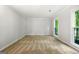Bright bedroom with neutral carpet, white walls and ample natural light at 335 Cedar Ln, Fayetteville, GA 30214