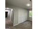 Bright bedroom featuring a spacious closet and neutral color scheme, perfect for relaxation at 335 Cedar Ln, Fayetteville, GA 30214