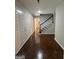 Welcoming entryway with hardwood floors and staircase, creating an inviting and open atmosphere at 335 Cedar Ln, Fayetteville, GA 30214
