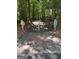 Paved golf cart path through a wooded area providing easy access to community amenities at 335 Cedar Ln, Fayetteville, GA 30214