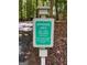 Sign indicating approved uses for the path: golf carts, pedestrians and bicycles are permitted at 335 Cedar Ln, Fayetteville, GA 30214