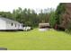 Backyard of home with deck at 124 Wynn Rd, Mcdonough, GA 30252