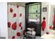 The bathroom features a unique shower curtain and natural light at 124 Wynn Rd, Mcdonough, GA 30252
