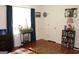 Cozy bedroom featuring a comfortable bed, dresser, and an abundance of natural light at 124 Wynn Rd, Mcdonough, GA 30252