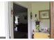 Foyer with yellow dresser, sunflower decor, and a view into the living room at 124 Wynn Rd, Mcdonough, GA 30252