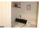 The laundry room features laundry symbols guide and vintage washer and dryer at 124 Wynn Rd, Mcdonough, GA 30252