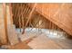 Attic with exposed rafters and insulation at 531 Grant Rd, Brooks, GA 30205