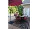 Outdoor seating with a table on a beautiful back deck at 531 Grant Rd, Brooks, GA 30205