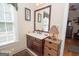 Charming bathroom featuring a vanity with wood cabinets and a sink at 531 Grant Rd, Brooks, GA 30205