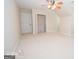 An attic bedroom with a ceiling fan and neutral carpet provides a serene and comfortable atmosphere at 531 Grant Rd, Brooks, GA 30205