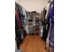 Organized walk-in closet featuring ample storage and shelving for clothes at 531 Grant Rd, Brooks, GA 30205