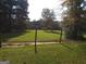 Expansive front lawn featuring a fenced pasture with horses, perfect for country living at 531 Grant Rd, Brooks, GA 30205