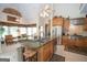 Bright kitchen with stainless steel appliances, large island, breakfast nook, and ample counter space at 531 Grant Rd, Brooks, GA 30205