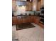 Kitchen with stainless steel appliances and tile backsplash at 531 Grant Rd, Brooks, GA 30205
