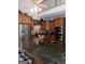 Modern kitchen with granite island, stainless appliances, and ample cabinet space at 531 Grant Rd, Brooks, GA 30205