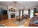 Spacious living room with fireplace, hardwood floors, and natural light at 531 Grant Rd, Brooks, GA 30205