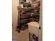 Walk-in pantry with shelving, a utility sink, and tile flooring at 531 Grant Rd, Brooks, GA 30205