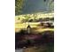 Peaceful pasture featuring a horse, lush greenery, and a tranquil setting at 531 Grant Rd, Brooks, GA 30205