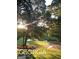 Tranquil pond surrounded by lush greenery, creating a picturesque and serene setting at 531 Grant Rd, Brooks, GA 30205
